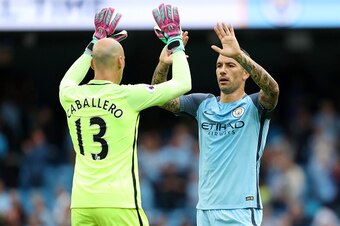 MANCHESTER, ENGLAND - AUGUST 28: Wilfredo Caballero and Aleksandar Kolarov of Manchester City celebrate at full time during the Premier League match between Manchester City and West Ham United at Etihad Stadium on August 28, 2016 in Manchester, England. (