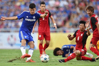 BANGKOK, THAILAND - MAY 30: Dominic Solanke #35 of Chelsea FC kicks the ball pass Yuthajak Konjan #6 of Thailand All-Stars during the international friendly match between Thailand All-Stars and Chelsea FC at Rajamangala Stadium on May 30, 2015 in Bangkok,