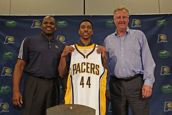 INDIANAPOLIS - JULY 11:  Jeff Teague speaks with the media after being introduced by Larry Bird of the Indiana Pacers at Bankers Life Fieldhouse on July 11, 2016 in Indianapolis, Indiana. NOTE TO USER: User expressly acknowledges and agrees that, by downl