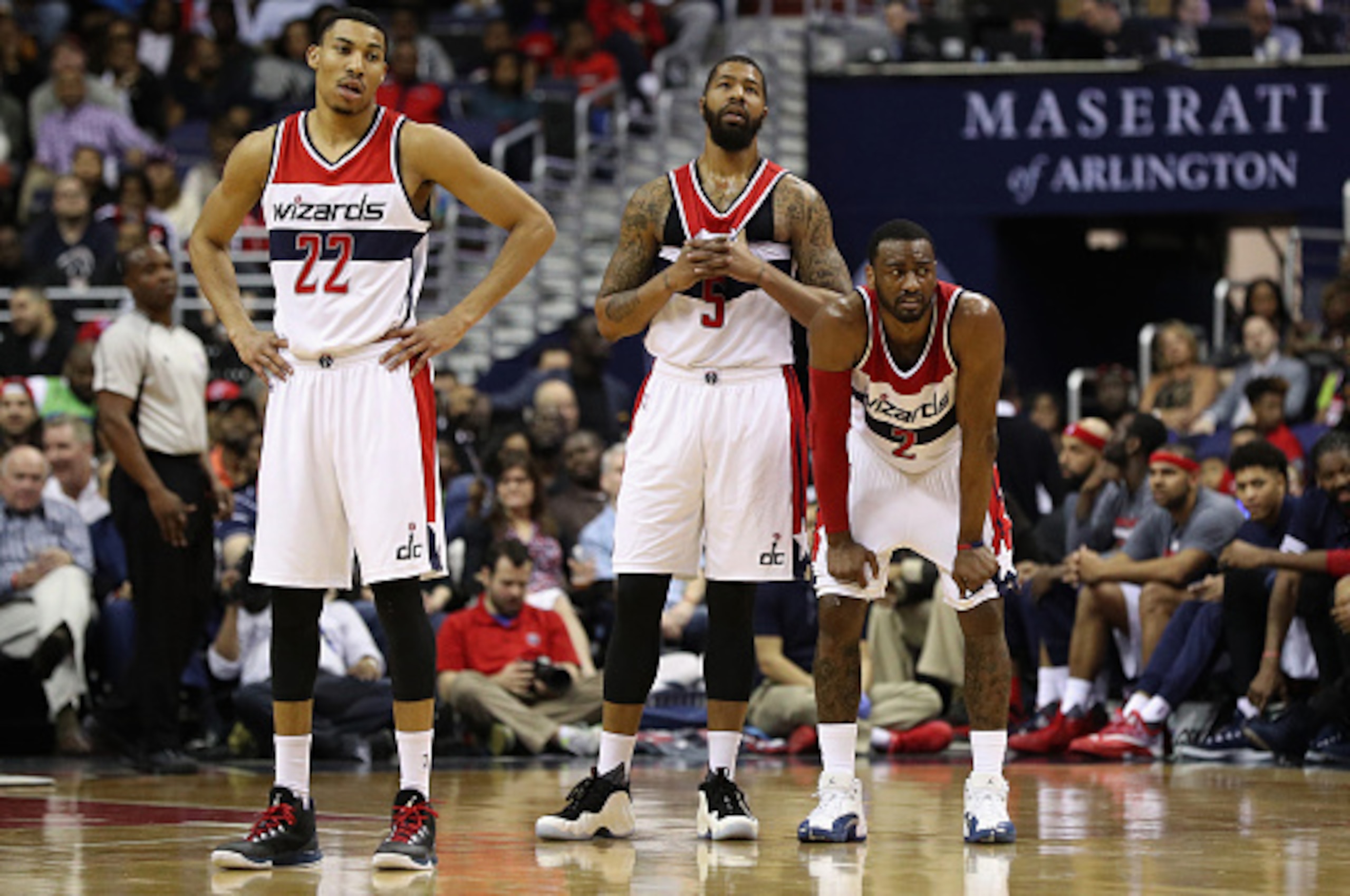 WASHINGTON, DC - MARCH 23: Otto Porter Jr. #22, Markieff Morris #5 and John Wall #2 of the Washington Wizards look on in the closing mintues of their 122-101 loss to the Atlanta Hawks at Verizon Center on March 23, 2016 in Washington, DC. NOTE TO USER: Us