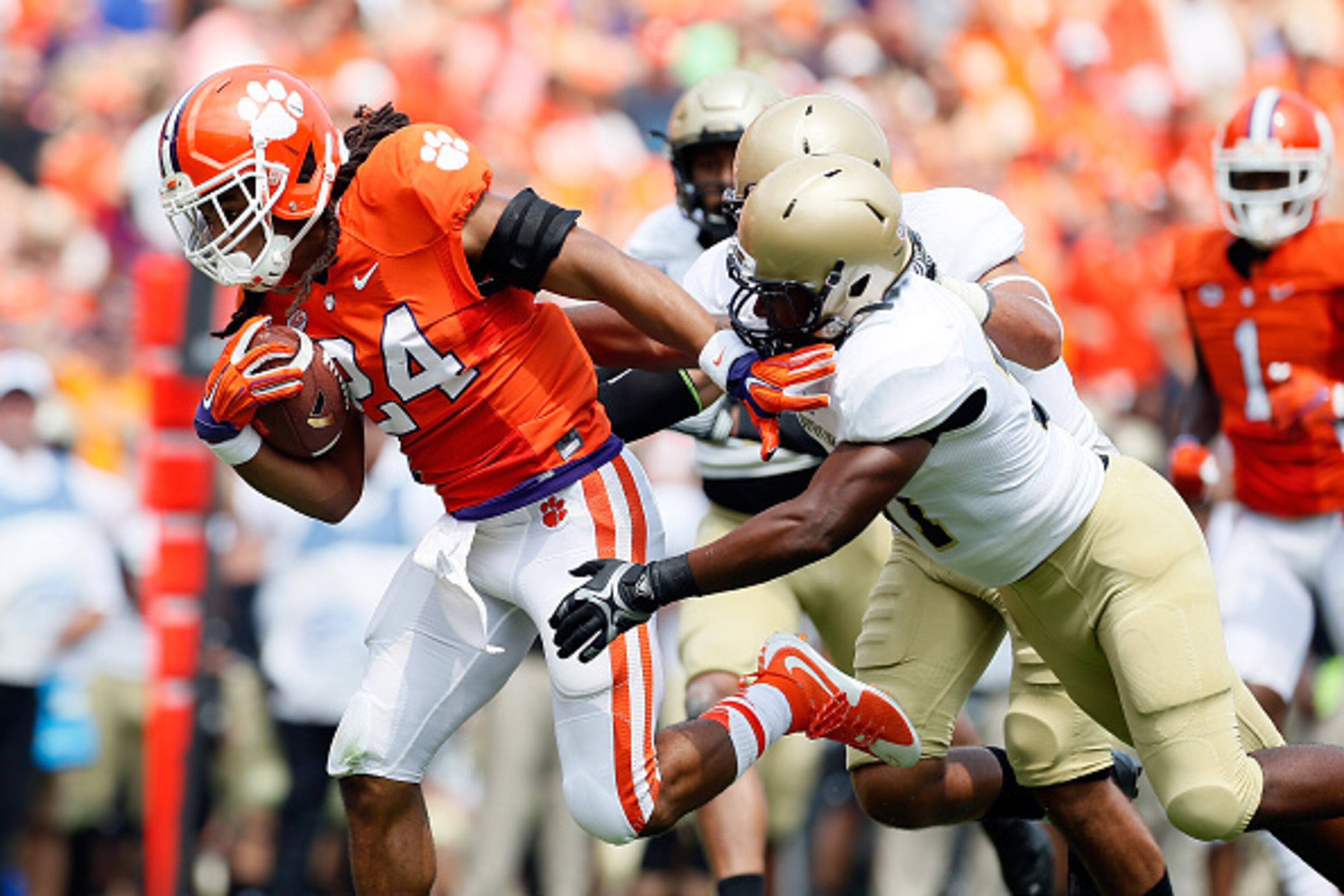 CLEMSON, SC - SEPTEMBER 5: Zac Brooks #24 of the Clemson Tigers rushes for a touchdown during the game against the Wofford Terriers at Clemson Memorial Stadium on September 5, 2015 in Clemson, South Carolina. (Photo by Tyler Smith/Getty Images)