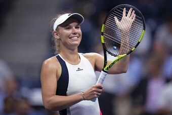 Caroline Wozniacki of Denmark celebrates her victory over  Anastasija Sevastova of Latvia during their 2016 US Open Women's Singles match at the USTA Billie Jean King National Tennis Center in New York on September 6, 2016. / AFP / EDUARDO MUNOZ ALVAREZ  