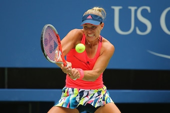 NEW YORK, NY - SEPTEMBER 06:  Angelique Kerber of Germany returns a shot against Roberta Vinci of Italy during their Women's Singles Quarterfinal Matchon Day Nine of the 2016 US Open at the USTA Billie Jean King National Tennis Center on September 6, 2016
