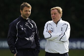 Manager of Tottenham Hotspur Harry Redknapp (R) talks to assistant Tim Sherwood during a training session at the club's training facility in north London, on April 12, 2011. Tottenham Hotspur are set to play Real Madrid in a UEFA Champions League Quarter 