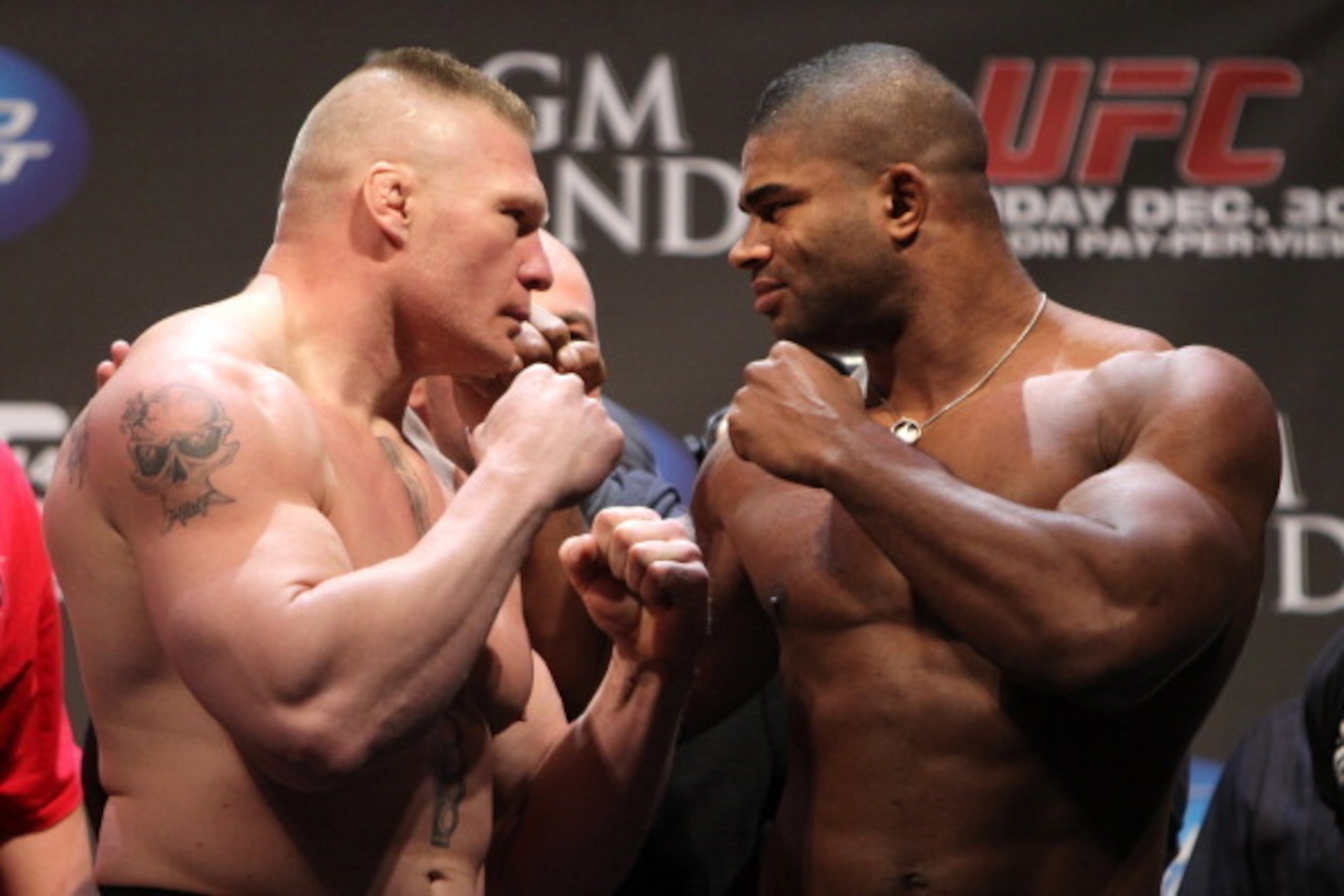 LAS VEGAS, NV - DECEMBER 29: (L-R) Heavyweight opponents Brock Lesnar and Alistair Overeem face off after weighing in during the UFC 141 Official Weigh In at the MGM Grand Garden Arena on December 29, 2011 in Las Vegas, United States. (Photo by Josh Hed LAS VEGAS, NV - DECEMBER 29: (L-R) Heavyweight opponents Brock Lesnar and Alistair Overeem face off after weighing in during the UFC 141 Official Weigh In at the MGM Grand Garden Arena on December 29, 2011 in Las Vegas, United States. (Photo by Josh Hed