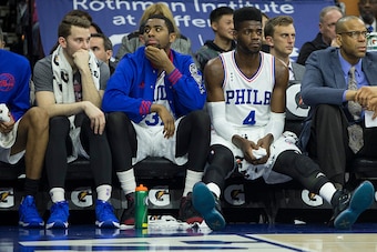 PHILADELPHIA, PA - DECEMBER 1: Nik Stauskas #11, Hollis Thompson #31, and Nerlens Noel #4 of the Philadelphia 76ers look on from the bench during the game against the Los Angeles Lakers on December 1, 2015 at the Wells Fargo Center in Philadelphia, Pennsy