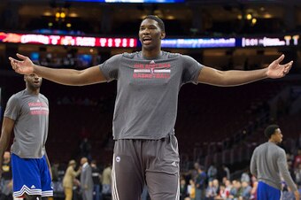 PHILADELPHIA, PA - JANUARY 10: Joel Embiid #21 of the Philadelphia 76ers has fun with Nerlens Noel #4 during warm ups prior to the game against the Cleveland Cavaliers on January 10, 2016 at the Wells Fargo Center in Philadelphia, Pennsylvania. NOTE TO US