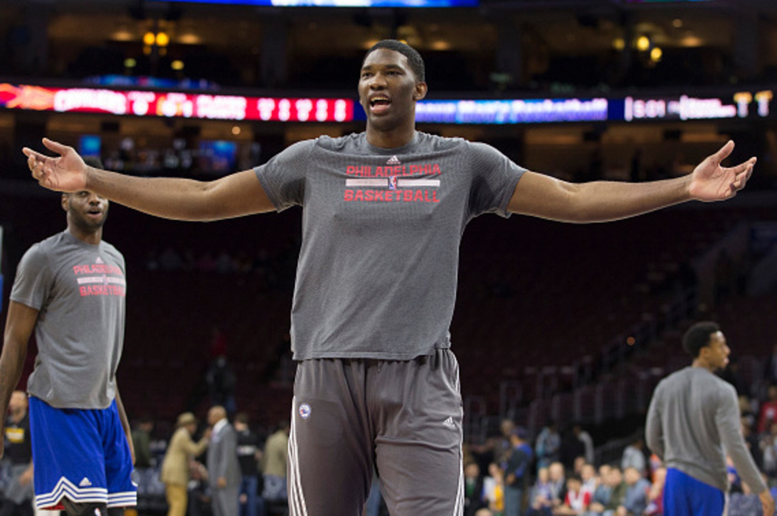 PHILADELPHIA, PA - JANUARY 10: Joel Embiid #21 of the Philadelphia 76ers has fun with Nerlens Noel #4 during warm ups prior to the game against the Cleveland Cavaliers on January 10, 2016 at the Wells Fargo Center in Philadelphia, Pennsylvania. NOTE TO US