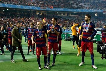 Iniesta celebrates after winning the Club World Cup.