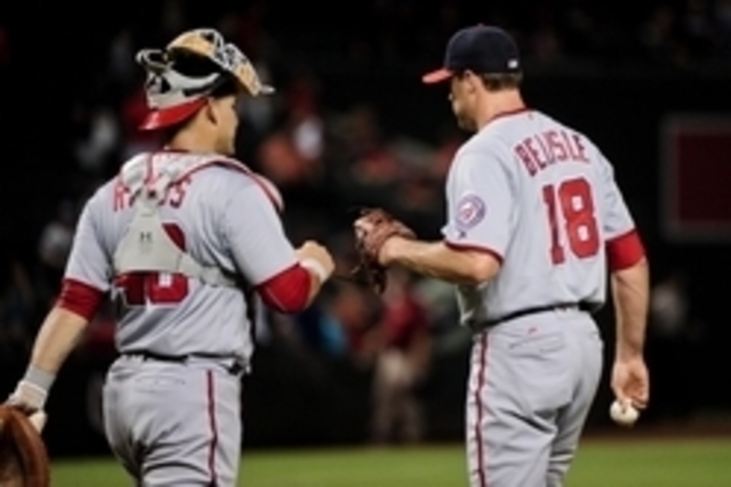 Aug 2, 2016; Phoenix, AZ, USA; Washington Nationals relief pitcher Matt Belisle (18) celebrates with catcher Wilson Ramos (40) after beating the Arizona Diamondbacks 10-4 at Chase Field. Mandatory Credit: Matt Kartozian-USA TODAY Sports Aug 2, 2016; Phoenix, AZ, USA; Washington Nationals relief pitcher Matt Belisle (18) celebrates with catcher Wilson Ramos (40) after beating the Arizona Diamondbacks 10-4 at Chase Field. Mandatory Credit: Matt Kartozian-USA TODAY Sports