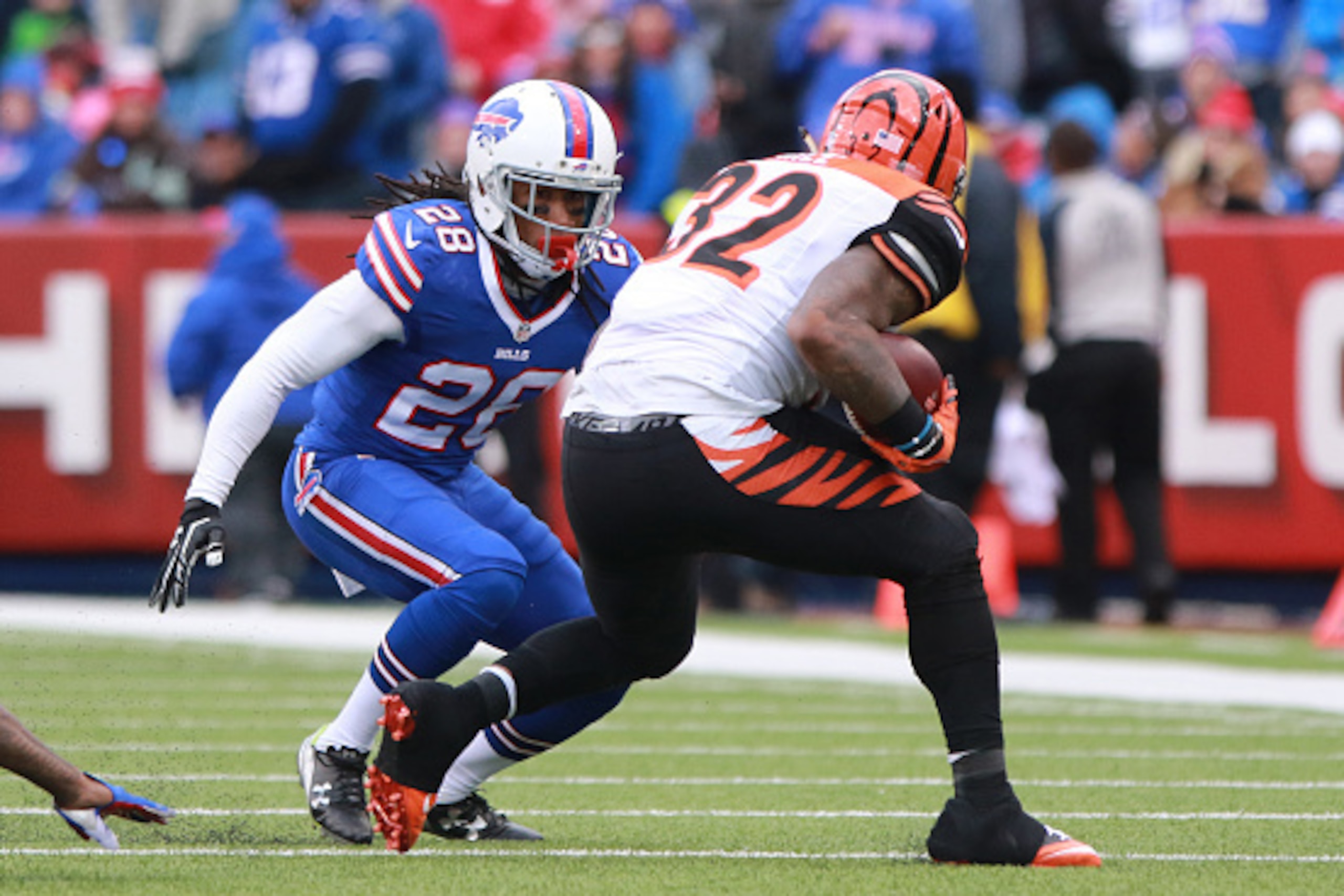 ORCHARD PARK, NY - OCTOBER 18:  Ronald Darby #28 of the Buffalo Bills makes a play on Jeremy Hill #32 of the Cincinnati Bengals during game action at Ralph Wilson Stadium on October 18, 2015 in Orchard Park, New York. (Photo by Jerome Davis/Getty Images)