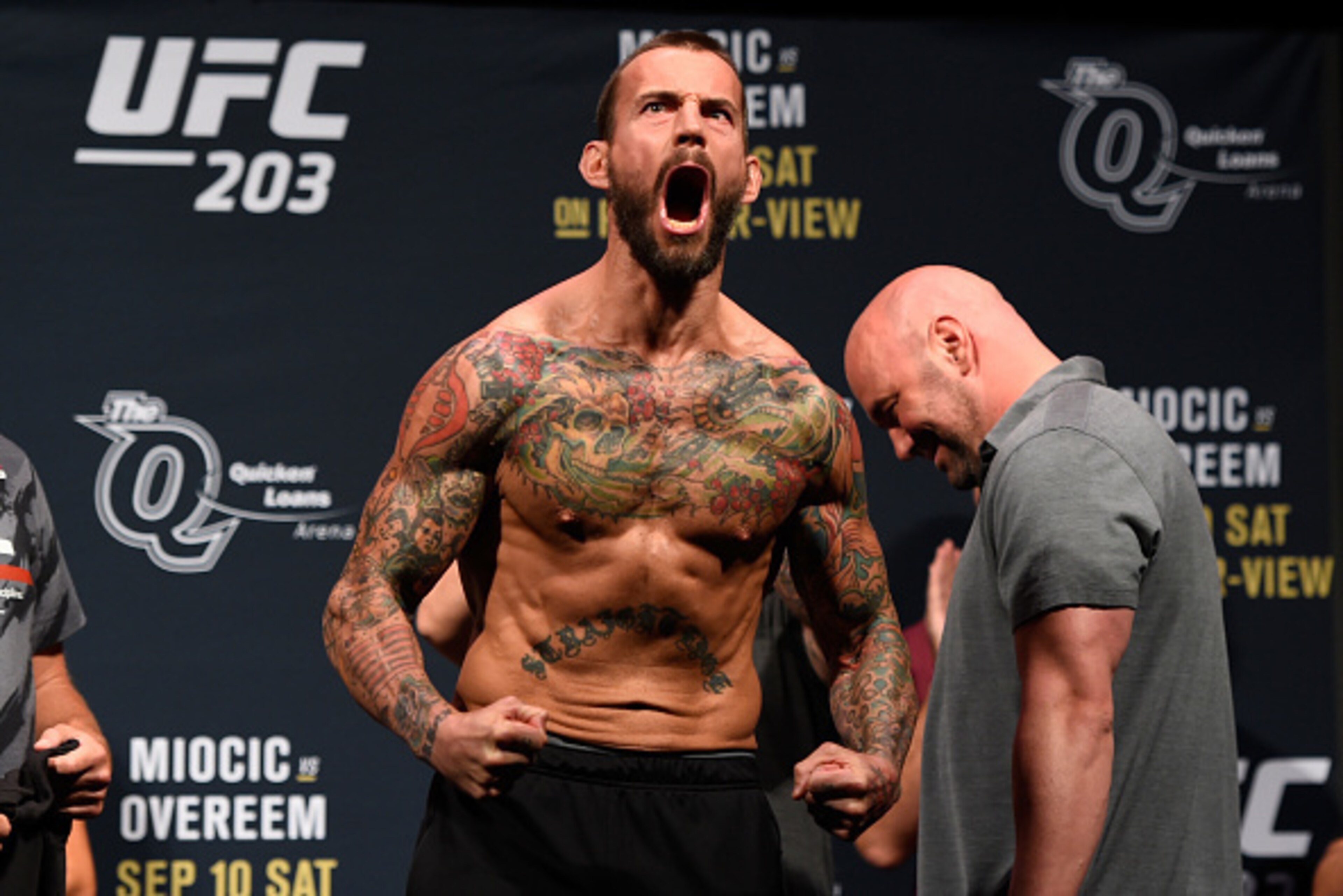 CLEVELAND, OH - SEPTEMBER 09:  Phil 'CM Punk' Brooks of the United States reacts to the crowd during the UFC 203 Weigh-in at Quicken Loans Arena on September 9, 2016 in Cleveland, Ohio. (Photo by Josh Hedges/Zuffa LLC/Zuffa LLC via Getty Images)