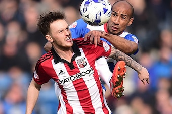 LONDON, ENGLAND - MARCH 12:  Karl Henry (R) of Queens Park Rangers and Josh McEachran of Brentford contest the ball during the Sky Bet Championship match between Queens Park Rangers and Brentford at Loftus Road on March 12, 2016 in London, England. (Photo