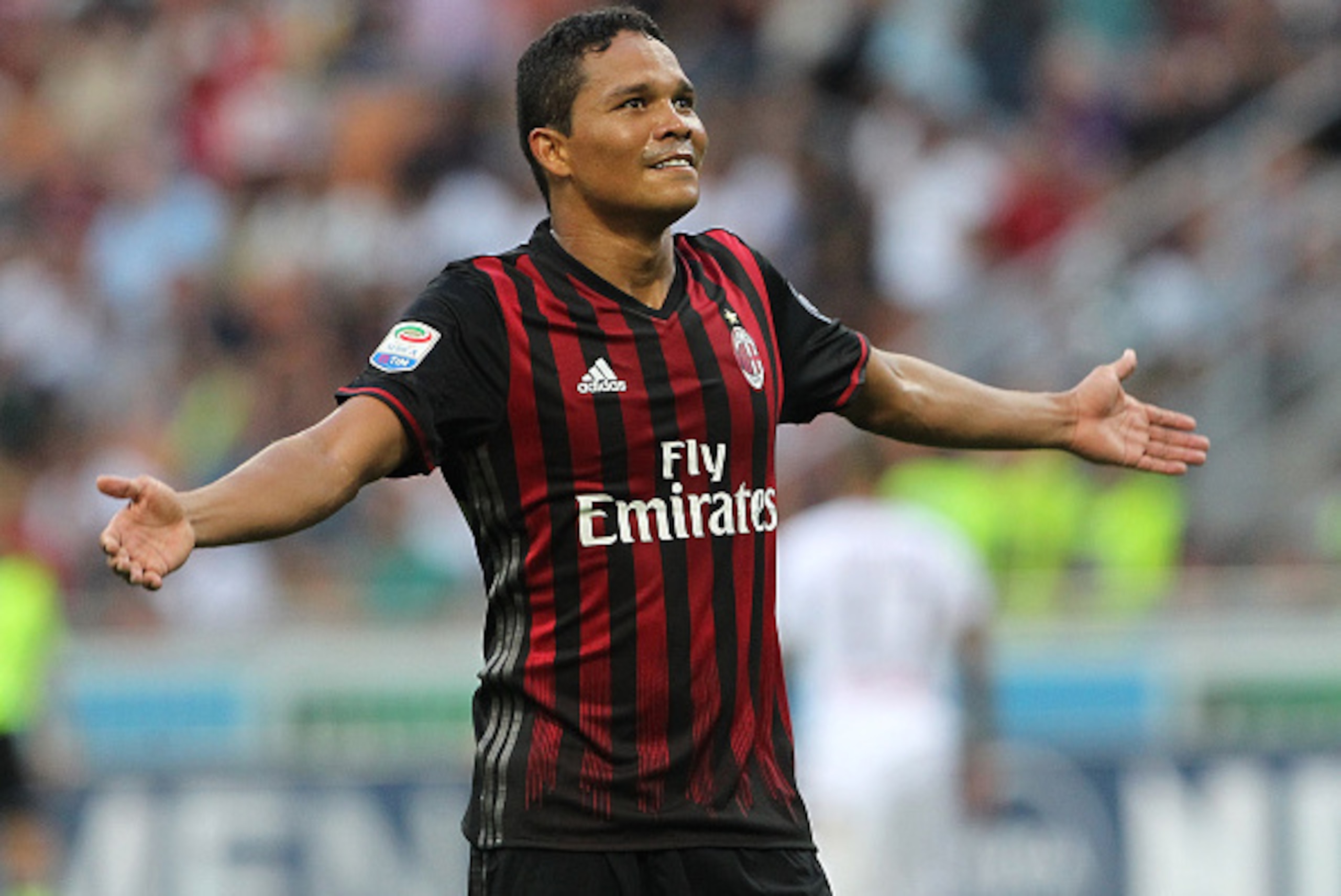 MILAN, ITALY - AUGUST 21:  Carlos Bacca of AC Milan celebrates his third goal during the Serie A match between AC Milan and FC Torino at Stadio Giuseppe Meazza on August 21, 2016 in Milan, Italy.  (Photo by Marco Luzzani/Getty Images)