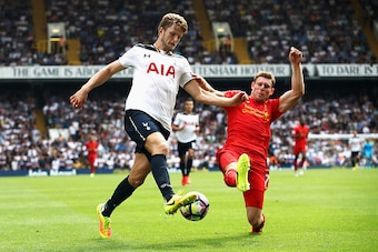 LONDON, ENGLAND - AUGUST 27: Eric Dier of Tottenham Hotspur (L) is challegned by James Milner of Liverpool (R) during the Premier League match between Tottenham Hotspur and Liverpool at White Hart Lane on August 27, 2016 in London, England.  (Photo by Jul