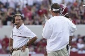 Sep 10, 2016; Tuscaloosa, AL, USA;  Alabama Crimson Tide head coach Nick Saban looks back at Crimson Tide offensive coordinator Lane Kiffin and quarterback Jalen Hurts (2) during the game against the Western Kentucky Hilltoppers at Bryant-Denny Stadium. T