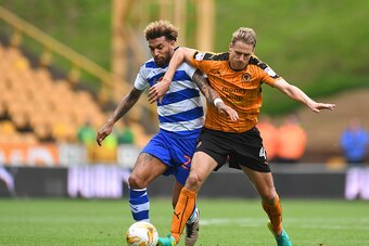 WOLVERHAMPTON, ENGLAND - AUGUST 13: Danny Williams of Reading and Dave Edwards of Wolverhampton Wanderers during the Sky Bet Championship match between Wolverhampton Wanderers and Reading at Molineux on August 13, 2016 in Wolverhampton, England. (Photo by
