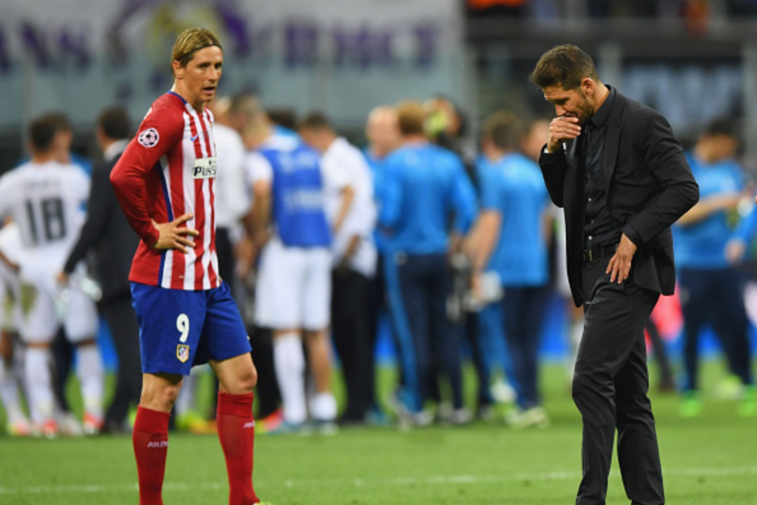 MILAN, ITALY - MAY 28: Fernando Torres of Atletico Madrid and Head coch Diego Simeone are seen during the UEFA Champions League Final match between Real Madrid and Club Atletico de Madrid at Stadio Giuseppe Meazza on May 28, 2016 in Milan, Italy. (Photo MILAN, ITALY - MAY 28: Fernando Torres of Atletico Madrid and Head coch Diego Simeone are seen during the UEFA Champions League Final match between Real Madrid and Club Atletico de Madrid at Stadio Giuseppe Meazza on May 28, 2016 in Milan, Italy. (Photo