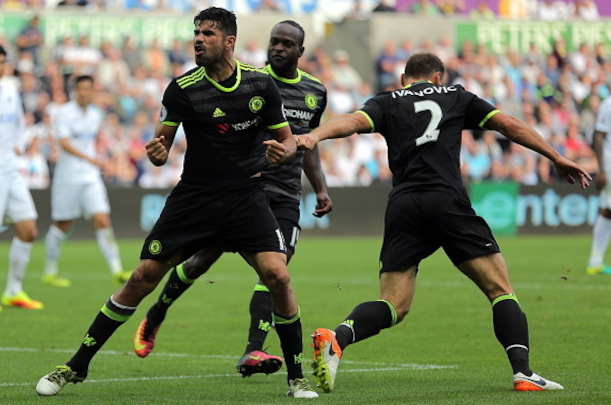 SWANSEA, WALES - SEPTEMBER 11: Diego Costa of Chelsea celebrates his second goal which he scored with a bicycle kick during the Premier League match between Swansea City and Chelsea at The Liberty Stadium on September 11, 2016 in Swansea, Wales. (photo by