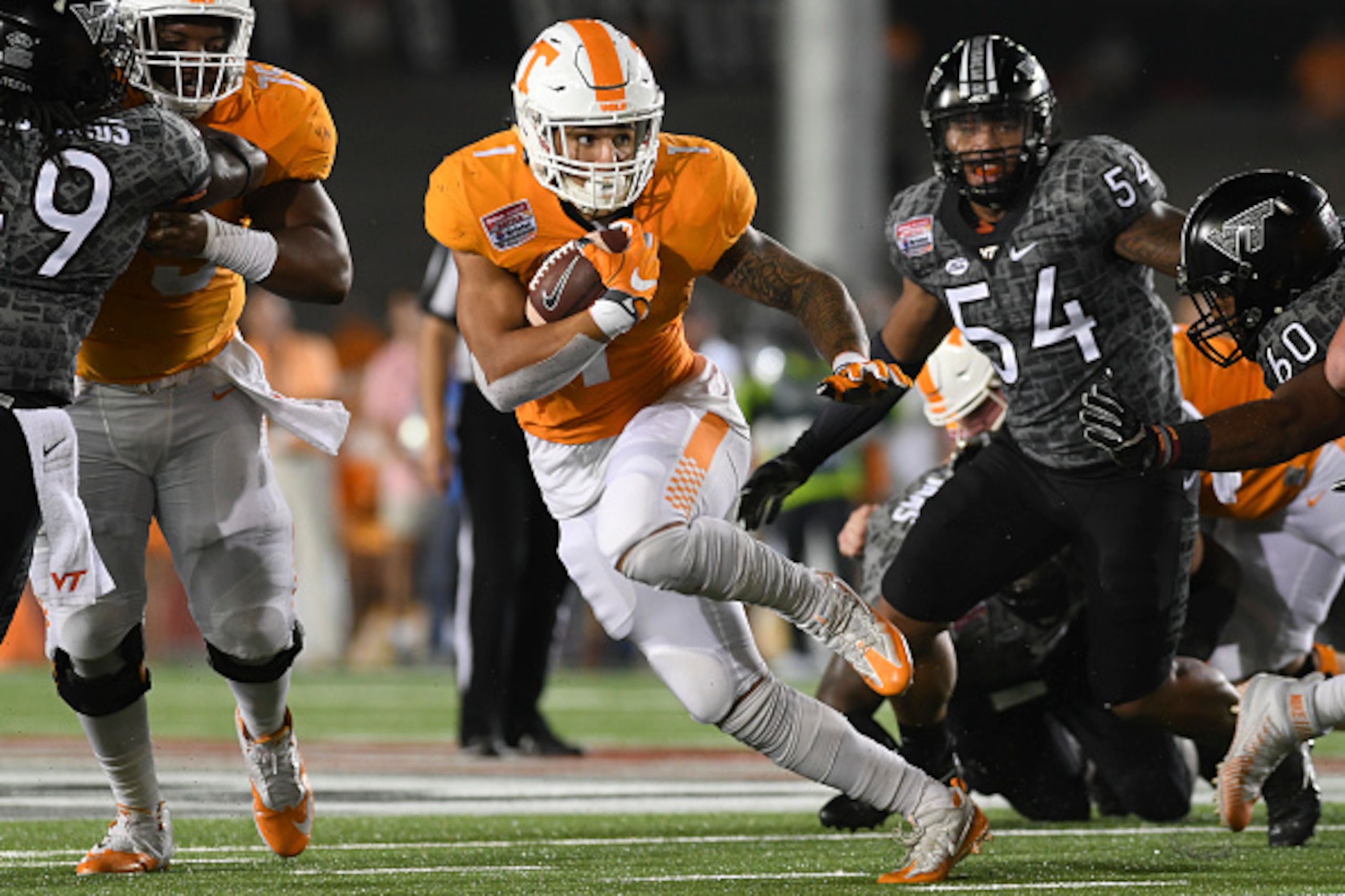 BRISTOL, TN - SEPTEMBER 10: Running back Jalen Hurd #1 of the Tennessee Volunteers carries the ball against the Virginia Tech Hokies in the first half at Bristol Motor Speedway on September 10, 2016 in Bristol, Tennessee.  (Photo by Michael Shroyer/Getty 