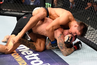 CLEVELAND, OH - SEPTEMBER 10:  Mickey Gall (top) attempts to submit Phil 'CM Punk' Brooks in their welterweight bout during the UFC 203 event at Quicken Loans Arena on September 10, 2016 in Cleveland, Ohio. (Photo by Josh Hedges/Zuffa LLC/Zuffa LLC via Ge