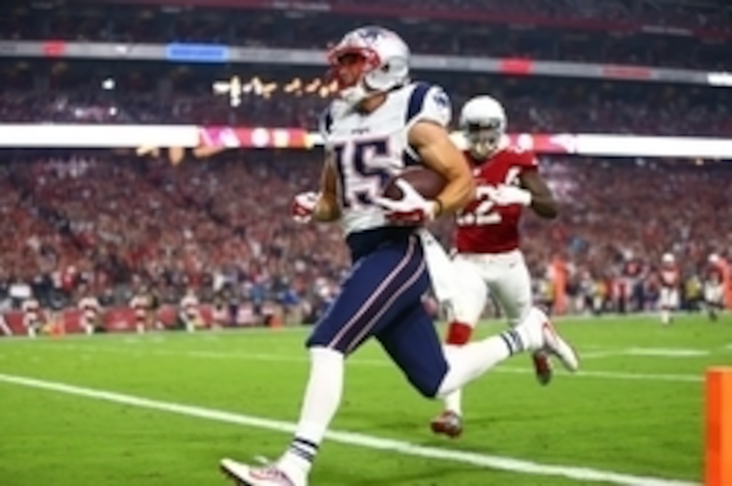 Sep 11, 2016; Glendale, AZ, USA; New England Patriots wide receiver Chris Hogan (15) scores a first quarter touchdown against the Arizona Cardinals at University of Phoenix Stadium. Mandatory Credit: Mark J. Rebilas-USA TODAY Sports