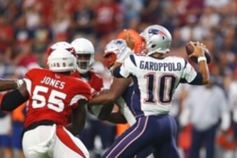Sep 11, 2016; Glendale, AZ, USA; New England Patriots quarterback Jimmy Garoppolo (10) throws a pass in the first quarter against the Arizona Cardinals at University of Phoenix Stadium. Mandatory Credit: Mark J. Rebilas-USA TODAY Sports