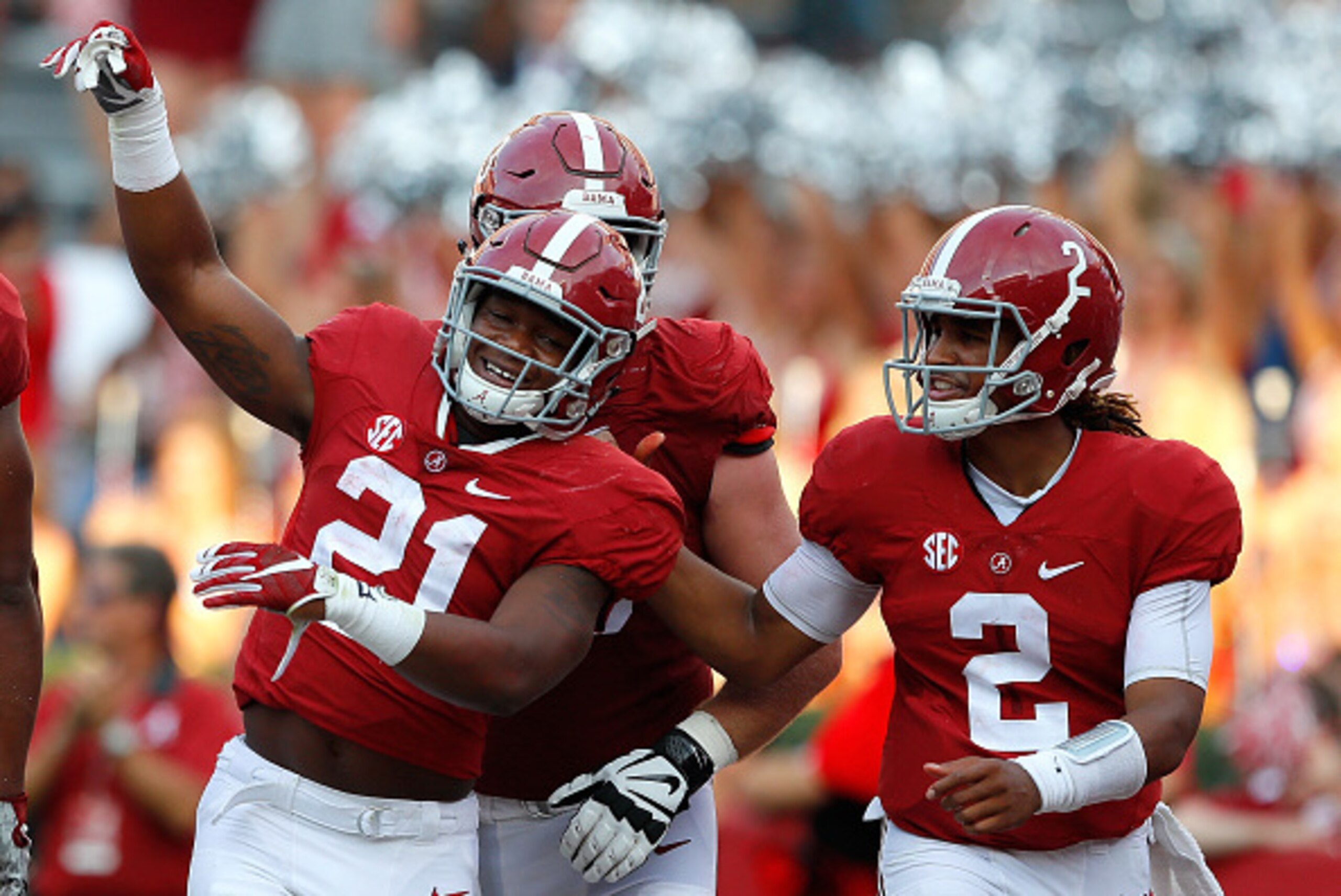 TUSCALOOSA, AL - SEPTEMBER 10:  B.J. Emmons #21 of the Alabama Crimson Tide reacts after scoring a touchdown against the Western Kentucky Hilltoppers with Jalen Hurts #2 at Bryant-Denny Stadium on September 10, 2016 in Tuscaloosa, Alabama.  (Photo by Kevi