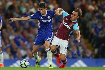 LONDON, ENGLAND - AUGUST 15: Oscar of Chelsea and Mark Noble of West Ham during the Premier League match between Chelsea and West Ham United at Stamford Bridge on August 15, 2016 in London, England. (Photo by Catherine Ivill - AMA/Getty Images)