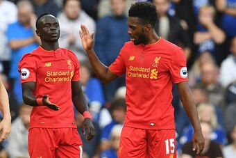 Liverpool's Senegalese midfielder Sadio Mane celebrates with Liverpool's English striker Daniel Sturridge (R) after scoring their second goal during the English Premier League football match between Liverpool and Leicester City at Anfield in Liverpool, no