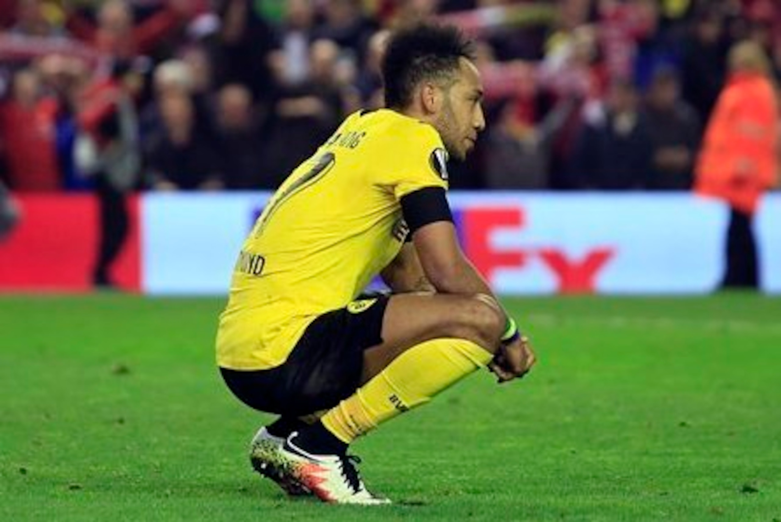 A stunned Pierre-Emerick Aubameyang after the collapse at Anfield. A stunned Pierre-Emerick Aubameyang after the collapse at Anfield.