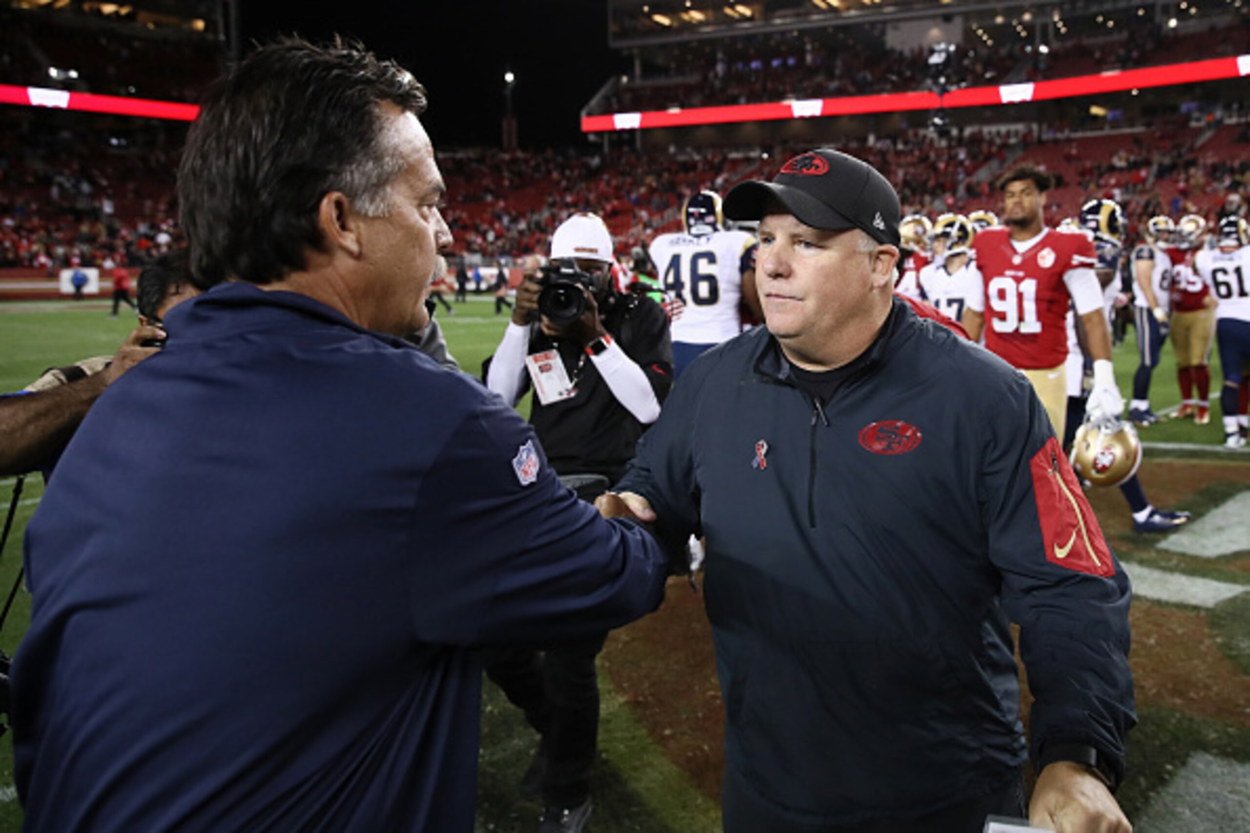 SANTA CLARA, CA - SEPTEMBER 12:  Head coach Chip Kelly of the San Francisco 49ers shakes hands with head coach Jeff Fisher of the Los Angeles Rams following their NFL game at Levi's Stadium on September 12, 2016 in Santa Clara, California.  (Photo by Ezra