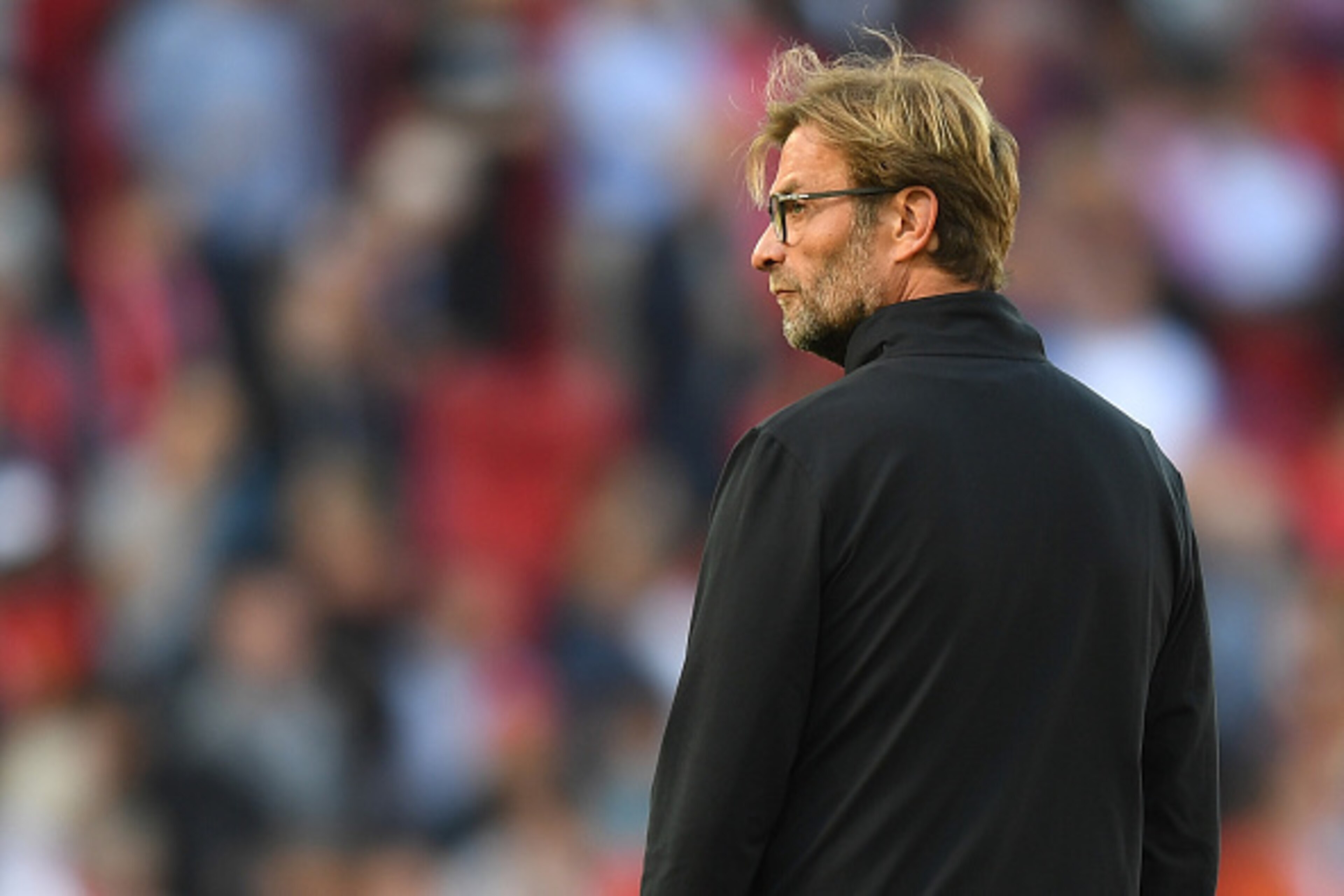 LIVERPOOL, ENGLAND - SEPTEMBER 10:  Jurgen Klopp, Manager of Liverpool looks on while his team warm up during the Premier League match between Liverpool and Leicester City at Anfield on September 10, 2016 in Liverpool, England.  (Photo by Michael Regan/Ge
