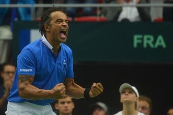 Captain of French Davis Cup tennis team Yannick Noah reacts during the match between Jo-Wilfried Tsonga of France and Jiri Vesely of Czech Republic at the International Tennis Federation Davis Cup quarter-final between Czech Republic and France on July 17