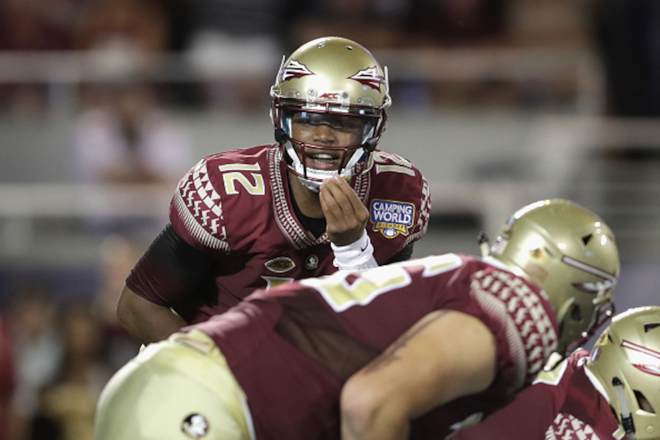 ORLANDO, FL - SEPTEMBER 05:  Deondre Francois #12 of the Florida State Seminoles communicates at the line of scrimmage in the first half against the Mississippi Rebels during the Camping World Kickoff at Camping World Stadium on September 5, 2016 in Orlan