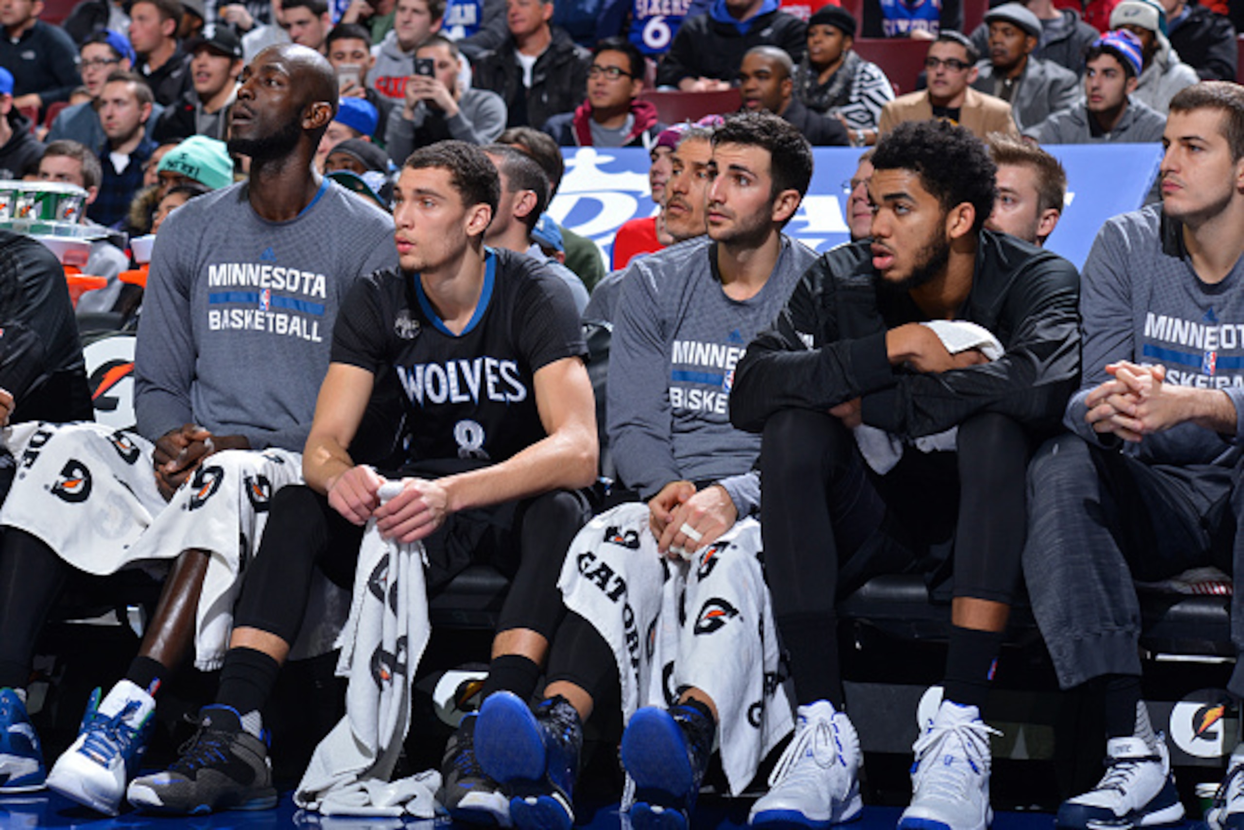 PHILADELPHIA - JANUARY 04:  Kevin Garnett #21, Ricky Rubio #9, Zach LaVine #8 and Karl-Anthony Towns #32 of the Minnesota Timberwolves sit on the bench during the game against the Philadelphia 76ers at the Wells Fargo Center on January 4, 2016 in Philadel