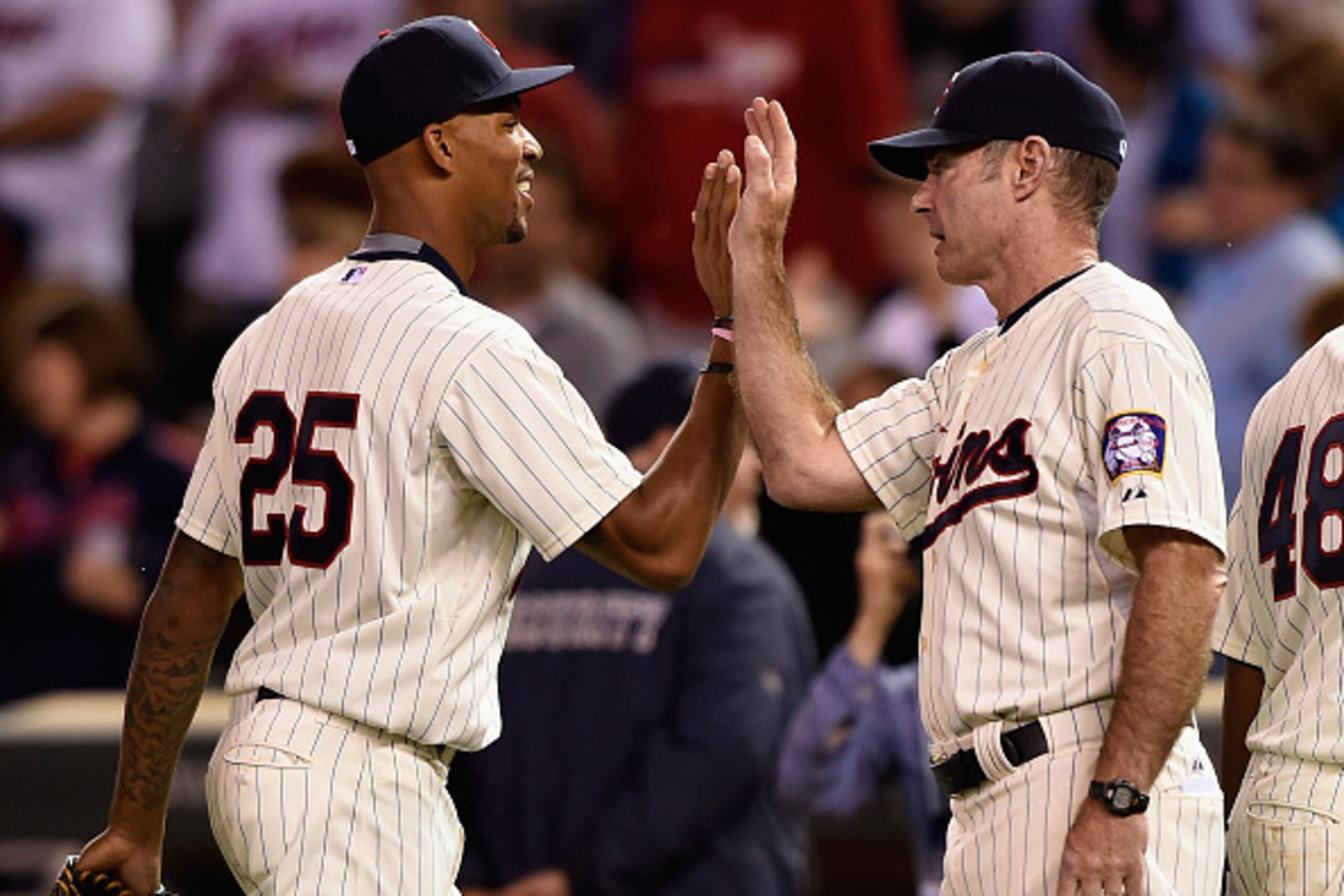 MINNEAPOLIS, MN - JUNE 17: Byron Buxton #25 and manager Paul Molitor #4 of the Minnesota Twins celebrate a win of the game against the St. Louis Cardinals on June 17, 2015 at Target Field in Minneapolis, Minnesota. The Twins defeated the Cardinals 3-1. (P MINNEAPOLIS, MN - JUNE 17: Byron Buxton #25 and manager Paul Molitor #4 of the Minnesota Twins celebrate a win of the game against the St. Louis Cardinals on June 17, 2015 at Target Field in Minneapolis, Minnesota. The Twins defeated the Cardinals 3-1. (P