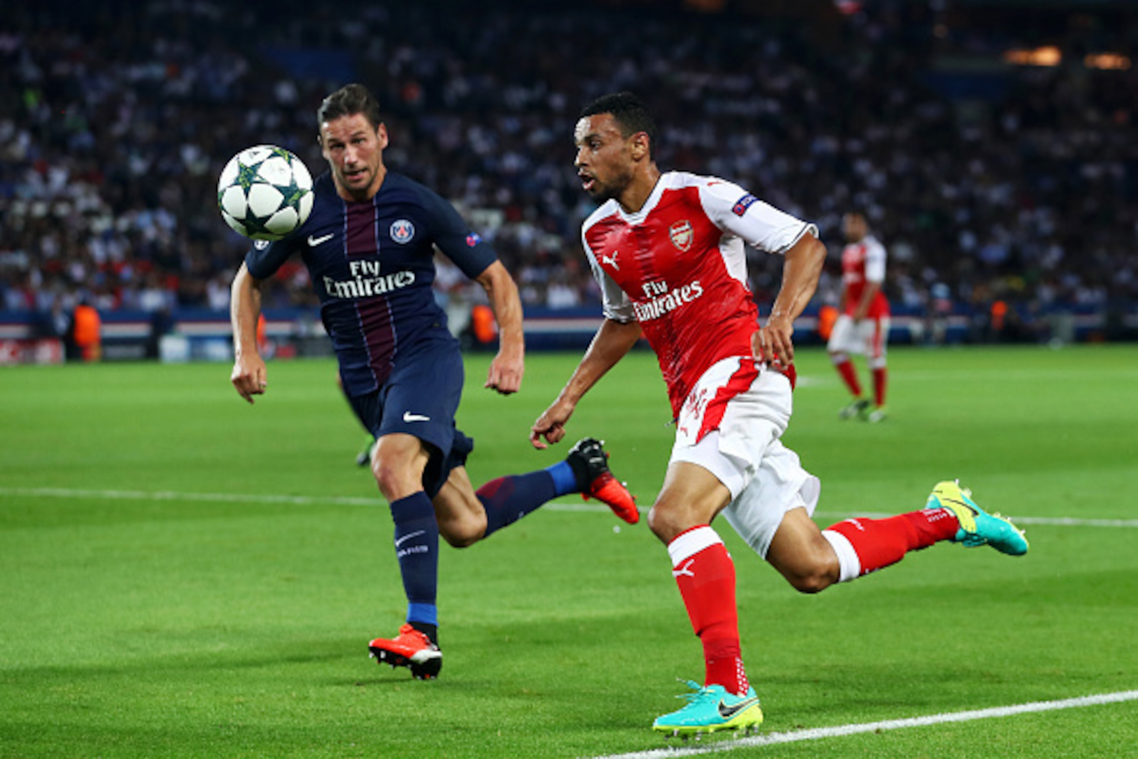 PARIS, FRANCE - SEPTEMBER 13:  Francis Coquelin of Arsneal and Maxwell of PSG in action during the UEFA Champions League Group A match between Paris Saint-Germain and Arsenal FC at Parc des Princes on September 13, 2016 in Paris, France.  (Photo by Julian