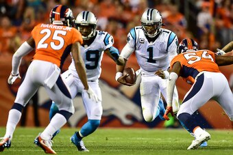 DENVER, CO - SEPTEMBER 8:  Quarterback Cam Newton #1 of the Carolina Panthers rushes against the Denver Broncos during a game  at Sports Authority Field at Mile High on September 8, 2016 in Denver, Colorado. (Photo by Dustin Bradford/Getty Images)