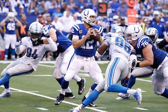 INDIANAPOLIS, IN - SEPTEMBER 11: Andrew Luck #12 of the Indianapolis Colts looks to pass while under pressure against the Detroit Lions during the game at Lucas Oil Stadium on September 11, 2016 in Indianapolis, Indiana. The Lions defeated the Colts 39-35