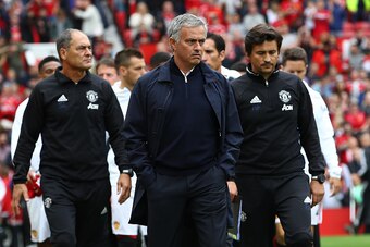 MANCHESTER, ENGLAND - SEPTEMBER 10:  Jose Mourinho, Manager of Manchester United and his backrroom team make their way to their seats during the Premier League match between Manchester United and Manchester City at Old Trafford on September 10, 2016 in Ma
