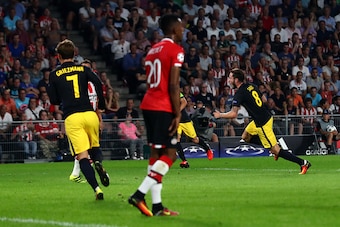 EINDHOVEN, NETHERLANDS - SEPTEMBER 13: Saul Niguez of Atletico Madrid celebrates scoring his sides first goal during the UEFA Champions League Group D match between PSV Eindhoven and Club Atletico de Madrid at Philips Stadion on September 13, 2016 in Eind