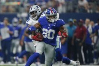 Sep 11, 2016; Arlington, TX, USA;  Dallas Cowboys cornerback Brandon Carr (39) takes down New York Giants wide receiver Victor Cruz (80) at AT&T Stadium. Mandatory Credit: Erich Schlegel-USA TODAY Sports