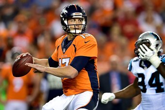 DENVER, CO - SEPTEMBER 08:  Quarterback Trevor Siemian #13 of the Denver Broncos passes the ball in the third quarter against the Carolina Panthers at Sports Authority Field at Mile High on September 8, 2016 in Denver, Colorado.  (Photo by Dustin Bradford