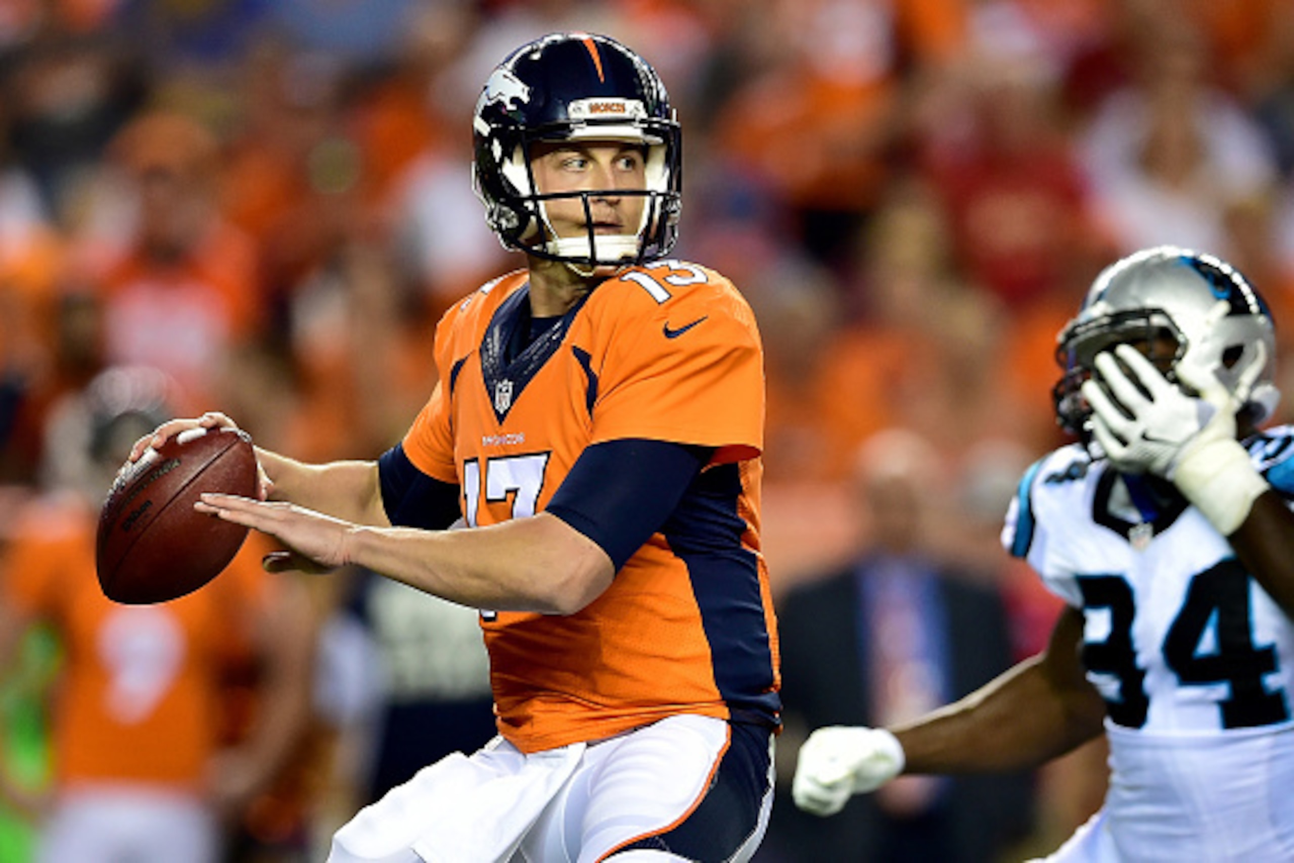 DENVER, CO - SEPTEMBER 08:  Quarterback Trevor Siemian #13 of the Denver Broncos passes the ball in the third quarter against the Carolina Panthers at Sports Authority Field at Mile High on September 8, 2016 in Denver, Colorado.  (Photo by Dustin Bradford