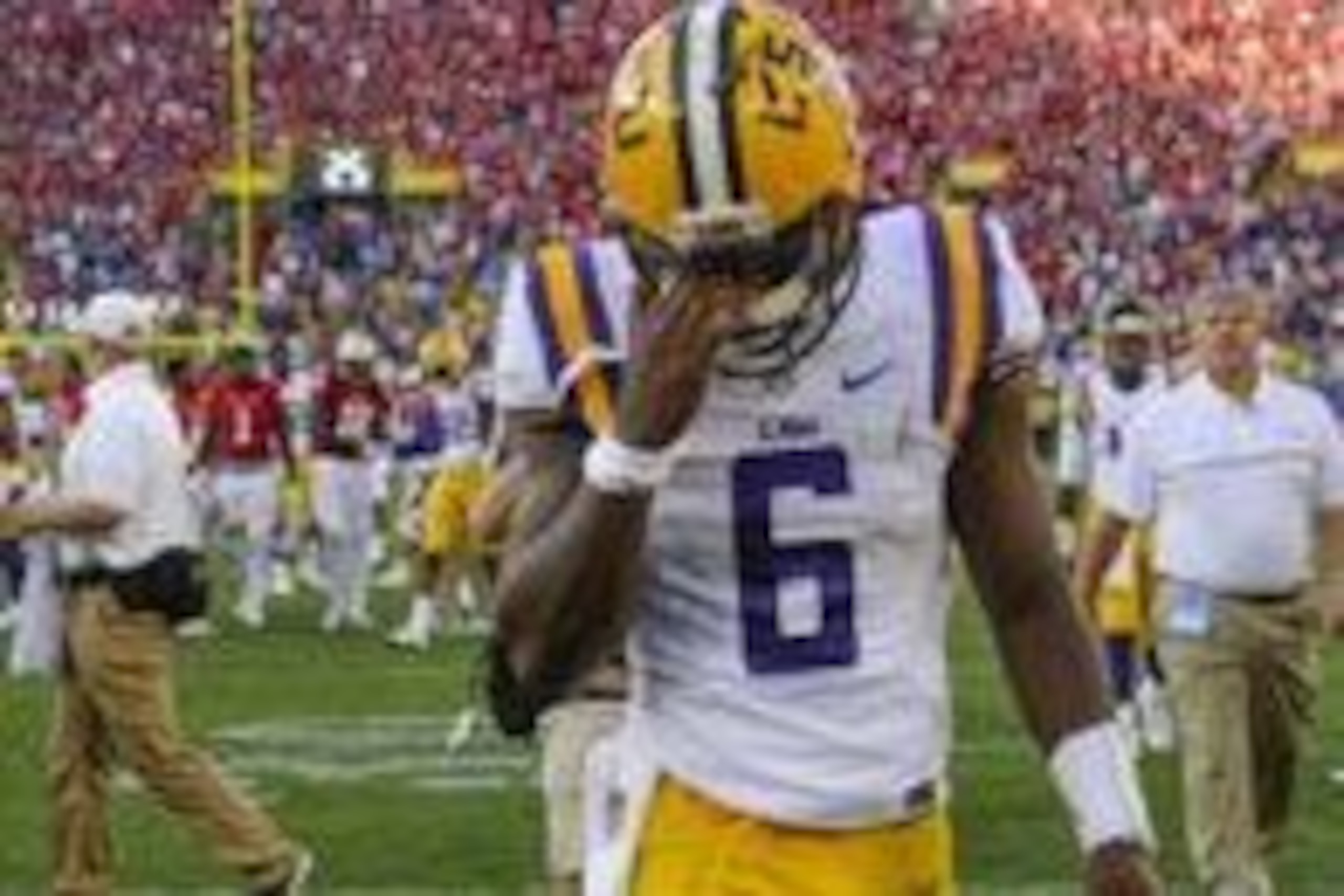 Sep 3, 2016; Green Bay, WI, USA; LSU Tigers quarterback Brandon Harris (6) walks off the field after the Wisconsin Badgers defeated LSU 16-14 at Lambeau Field. Mandatory Credit: Benny Sieu-USA TODAY Sports Sep 3, 2016; Green Bay, WI, USA; LSU Tigers quarterback Brandon Harris (6) walks off the field after the Wisconsin Badgers defeated LSU 16-14 at Lambeau Field. Mandatory Credit: Benny Sieu-USA TODAY Sports