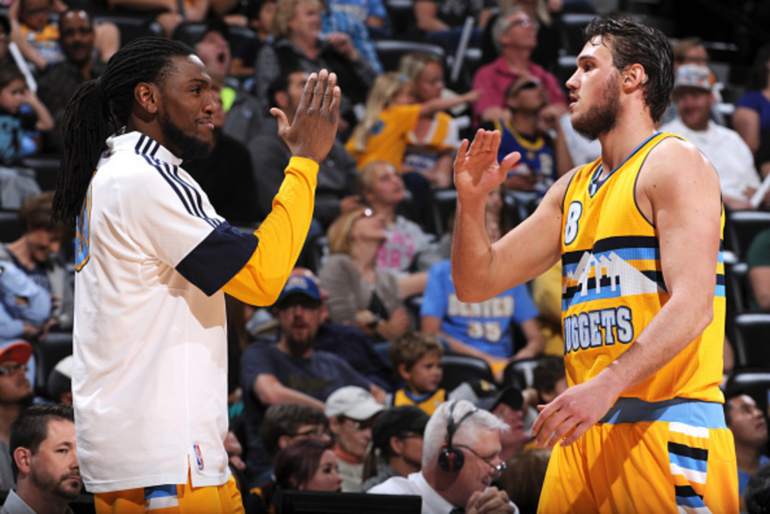 DENVER, CO - APRIL 12:  Kenneth Faried #35 and Danilo Gallinari #8 of the Denver Nuggets during the game against the Sacramento Kings on April 12, 2015 at the Pepsi Center in Denver, Colorado. NOTE TO USER: User expressly acknowledges and agrees that, by 