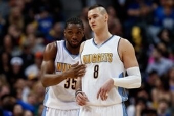 Feb 23, 2016; Denver, CO, USA; Denver Nuggets forward Kenneth Faried (35) talks with forward Danilo Gallinari (8) in the second quarter against the Sacramento Kings at Pepsi Center. Mandatory Credit: Isaiah J. Downing-USA TODAY Sports