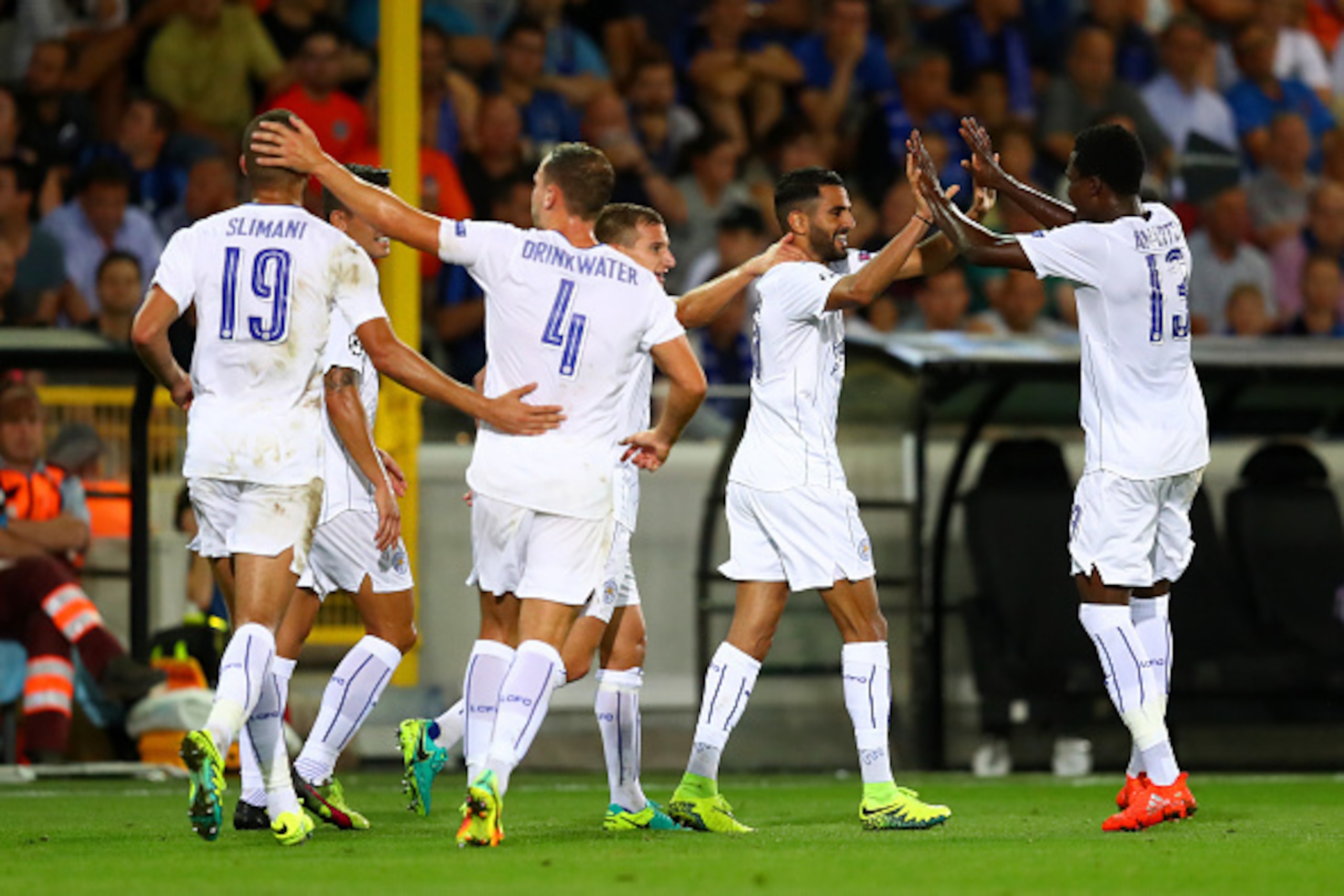 BRUGGE, BELGIUM - SEPTEMBER 14:  Goalscorer Riyad Mahrez of Leicester City celebrates with team-mates during the UEFA Champions League match between Club Brugge KV and Leicester City FC at Jan Breydel Stadium on September 14, 2016 in Brugge, Belgium.  (Ph