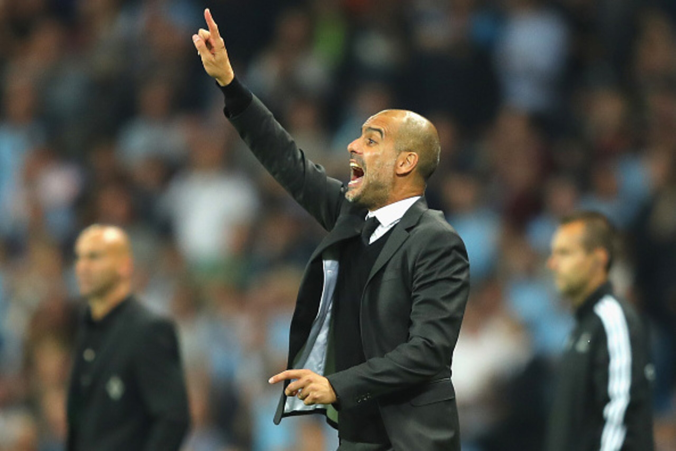 MANCHESTER, ENGLAND - SEPTEMBER 14: Josep Guardiola manager of Manchester City issues instructions to his players during the UEFA Champions League match between Manchester City FC and VfL Borussia Moenchengladbach at Etihad Stadium on September 14, 2016 i MANCHESTER, ENGLAND - SEPTEMBER 14: Josep Guardiola manager of Manchester City issues instructions to his players during the UEFA Champions League match between Manchester City FC and VfL Borussia Moenchengladbach at Etihad Stadium on September 14, 2016 i